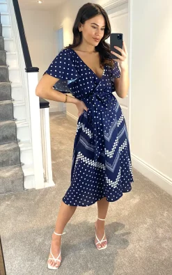 Goddiva Wrap Style Flutter Sleeve Printed Midi Dress In Navy 7 Goddiva Wrap Style Flutter Sleeve Printed Midi Dress In Navy -UK Skirt Sales 2023 2021 02 09 Megan Goddivva 4701