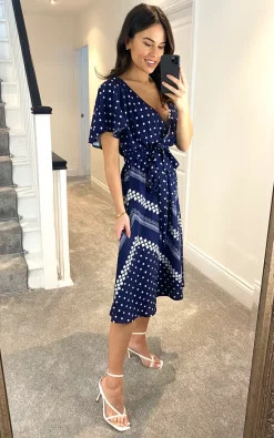 Goddiva Wrap Style Flutter Sleeve Printed Midi Dress In Navy 8 Goddiva Wrap Style Flutter Sleeve Printed Midi Dress In Navy -UK Skirt Sales 2023 2021 02 09 Megan Goddivva 4703